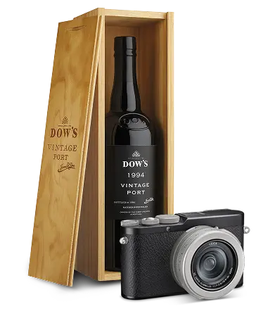 Leica d-lux 8 camera + a Magnum (1.5L) bottle of Dow's 1994 vintage port